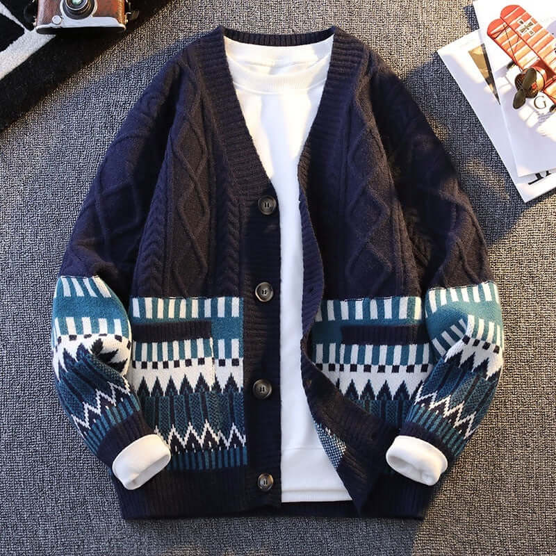Navy blue loose knit cardigan with geometric contrast color patterns and long sleeves, perfect for casual wear.