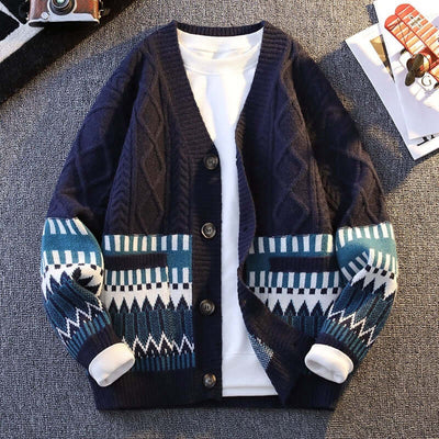 Navy blue loose knit cardigan with geometric contrast color patterns and long sleeves, perfect for casual wear.