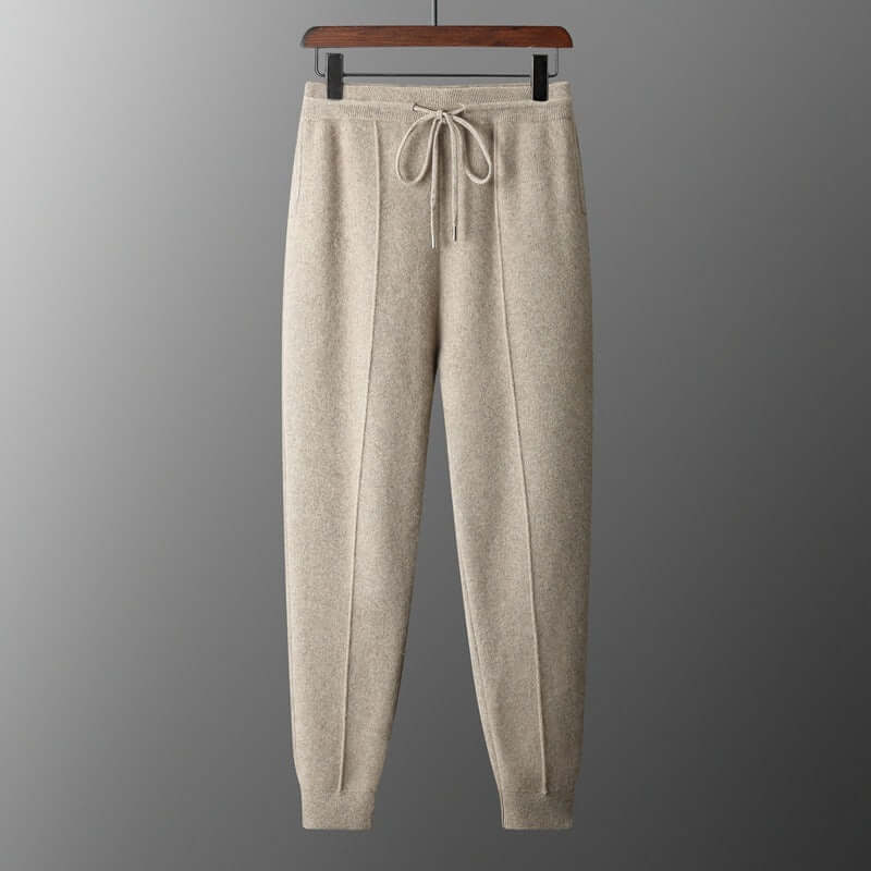 Men's warm cashmere pants in camel color with drawstring and tapered fit for casual wear.