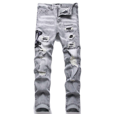 Men's gray skinny jeans with hole patch embroidery and a stylish cobra design, perfect for casual wear.