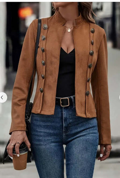 Female model wearing a double-row metal buckle deerskin velvet retro long-sleeved coat in dark brown.