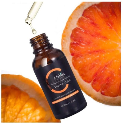 MABOX Skincare Vitamin C serum 30ml with dropper and orange slice, ideal for brightening and revitalizing skin.