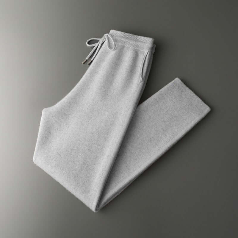 Light gray cashmere trousers with drawstring, ideal for casual and leisure wear.