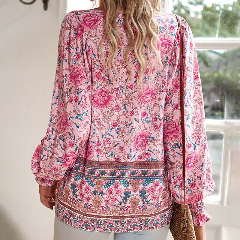 Womens boho chic long sleeve blouse in pink floral print with lace-up detail, ideal for vacation and casual wear.