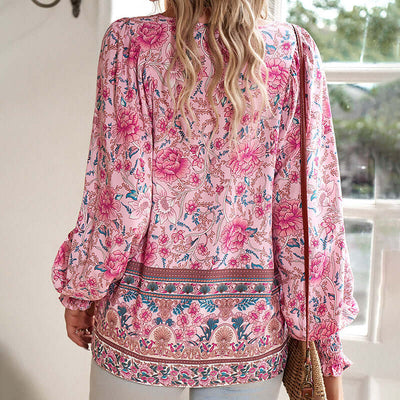 Womens boho chic long sleeve blouse in pink floral print with lace-up detail, ideal for vacation and casual wear.