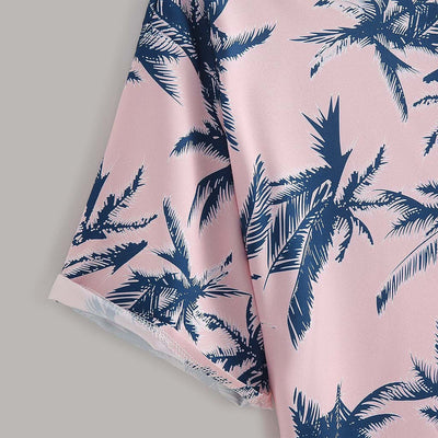Close-up of a pink shirt with blue palm tree print, perfect for casual summer parties or beach outings.