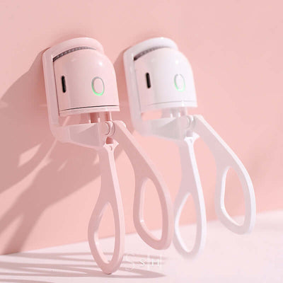 Thermal eyelash curler tool with handheld design and heat function