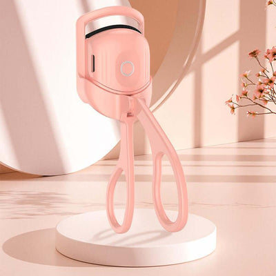 Thermal eyelash curler tool with handheld design and heat function