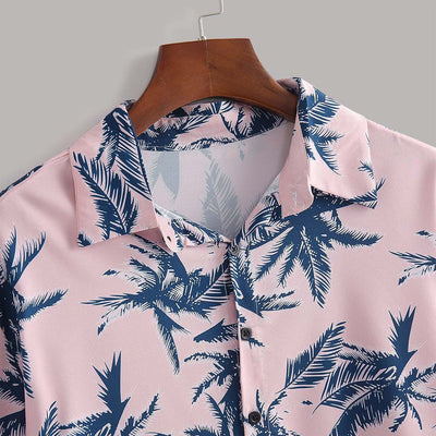 Light pink short-sleeve shirt with navy palm tree print, perfect for casual summer outings and parties.