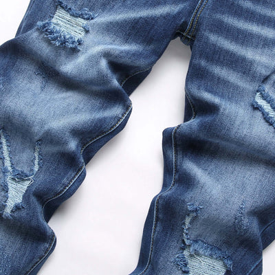 New blue ripped denim trousers featuring a slim fit and micro elasticity, perfect for street fashion.