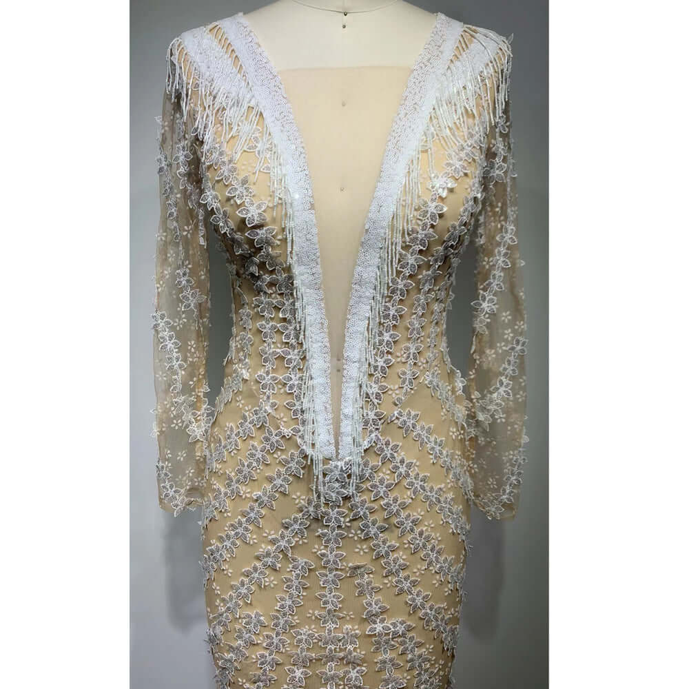 Curve-hugging evening gown with mermaid hem and open back