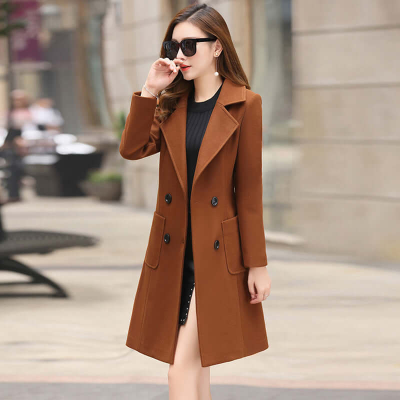 The vintage windbreaker pulls in the knee-length tweed coat eprolo