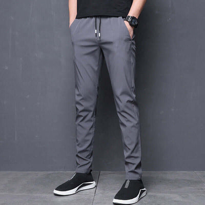Men's breathable thin gray pants with high elasticity and straight fit, ideal for casual wear.