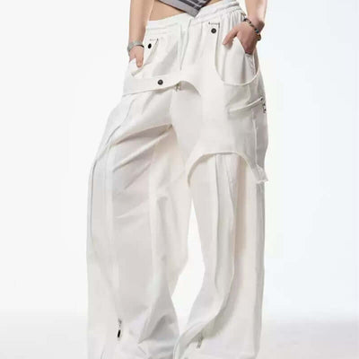Women's retro patchwork casual pants in white with pocket detailing, perfect for spring and summer outings.