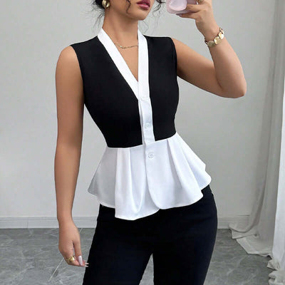 Women's sleeveless false-two-piece shirt in black and white with slim fit, featuring a stylish contrast color design.