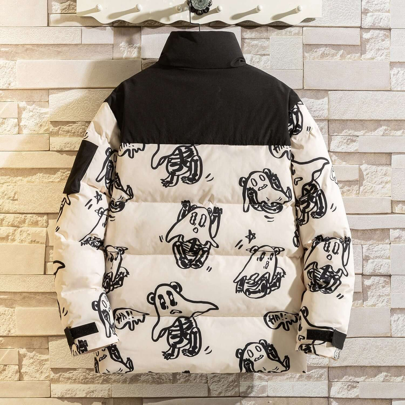 Korean style hooded winter jacket for men featuring playful ghost and skeleton print on a puffy design.