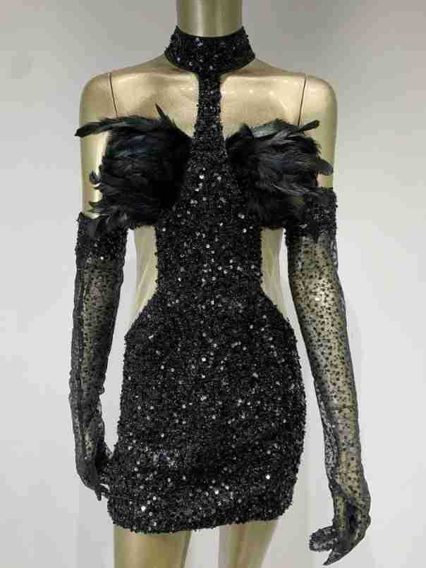 Glamorous feather-trimmed hip skirt dress with sparkly halter top