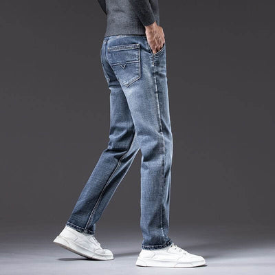 Men's blue loose straight stretch pants, mid-waist denim trousers, perfect for casual wear and comfort.