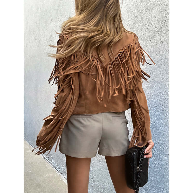 Genuine leather sheepskin suede tassel motorcycle jacket in brown on model, showcasing stylish fringe detail and cropped design.