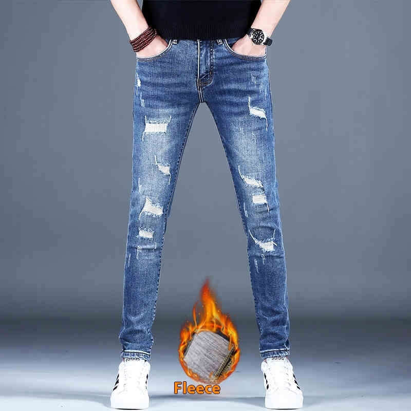Men's ripped fleece padded jeans in light blue, slim-fit casual style with visible distressing detail.