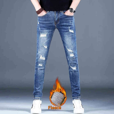 Men's ripped fleece padded jeans in light blue, slim-fit casual style with visible distressing detail.