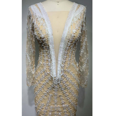 Curve-hugging evening gown with mermaid hem and open back