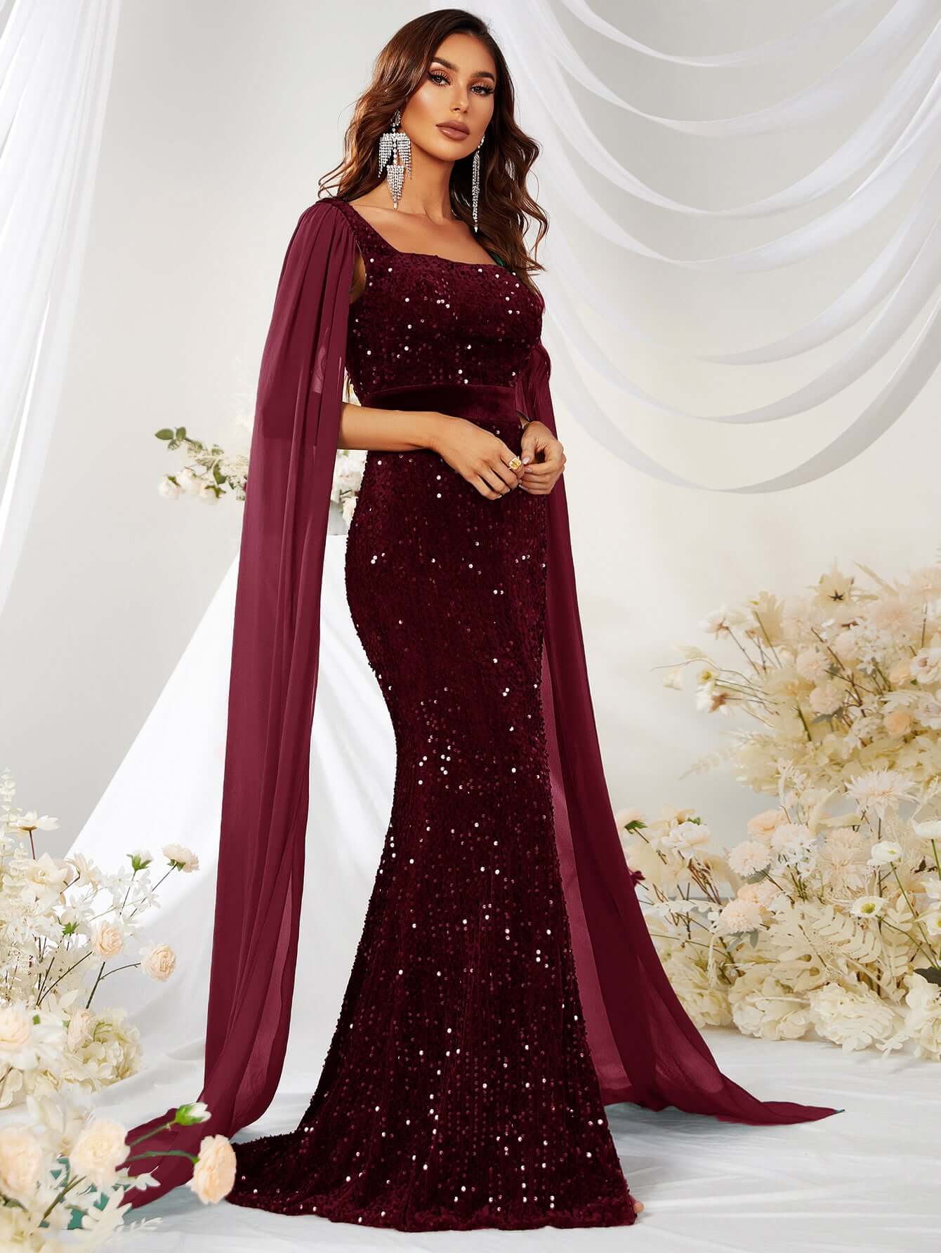 Elegant mermaid-style dress with mesh overlay and sparkle details