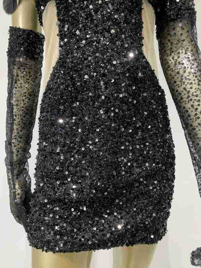 Glamorous feather-trimmed hip skirt dress with sparkly halter top