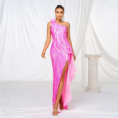 Elegant formal dress featuring sequins, single sleeve, and front slit