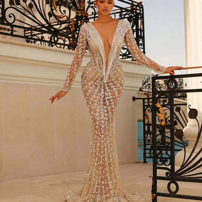 Curve-hugging evening gown with mermaid hem and open back
