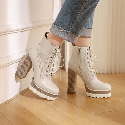 Women's beige chunky heel waterproof platform boots with side zipper and lace-up design.