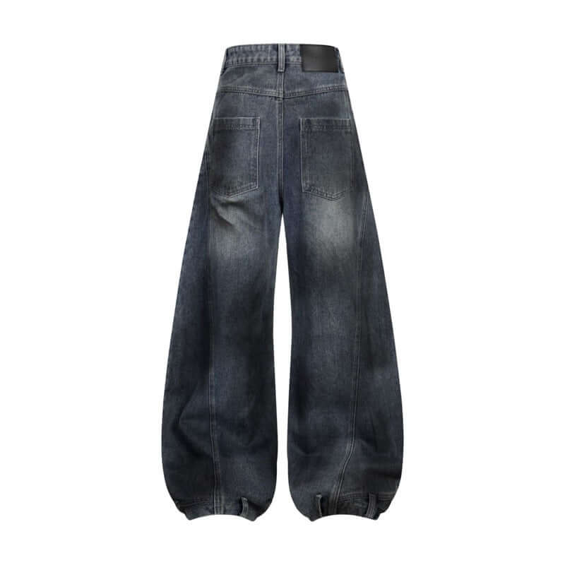 Back view of retro washed ripped deconstruction stitching straight jeans in dark blue denim fabric.
