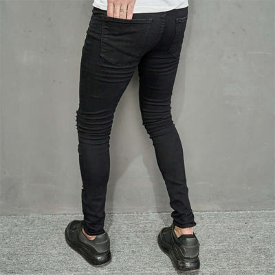 Men's black ripped skinny jeans showcasing a trendy fit, perfect for casual leisure wear, with micro-elastic fabric.
