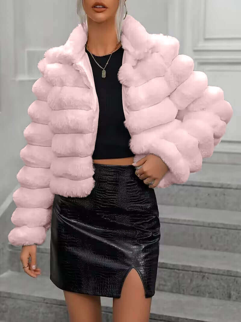 Stylish pink imitation fur coat for women, perfect for autumn and winter, featuring a chic design with long sleeves.