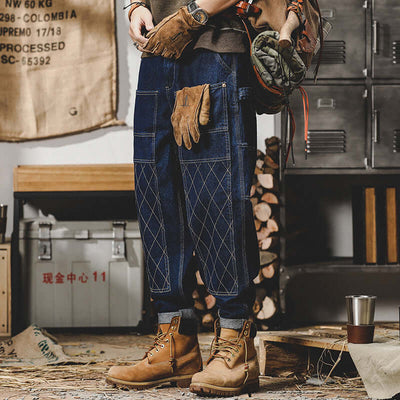 Men's retro workwear jeans in blue with bright lines, styled for autumn leisure, paired with brown boots.