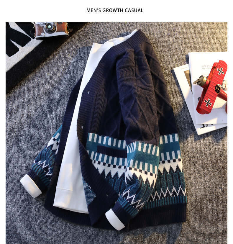 Navy blue knit cardigan with contrast color pattern, long sleeves, casual style, perfect for leisure wear.
