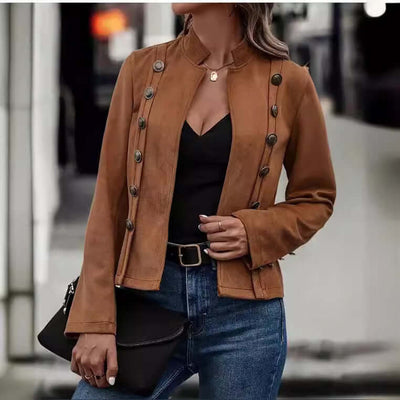 Stylish female in double-row metal buckle deerskin velvet retro coat with long sleeves, paired with jeans and a bag.