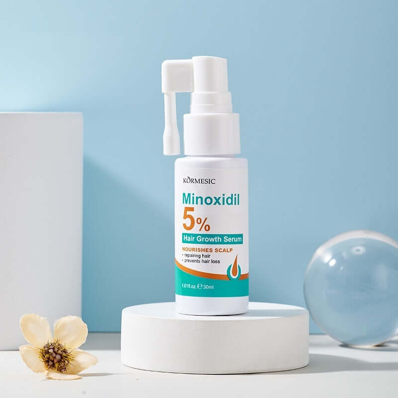 KORMESIC 5% Minoxidil Hair Growth Serum for nourishing scalp and preventing hair loss, presented in a sleek bottle.