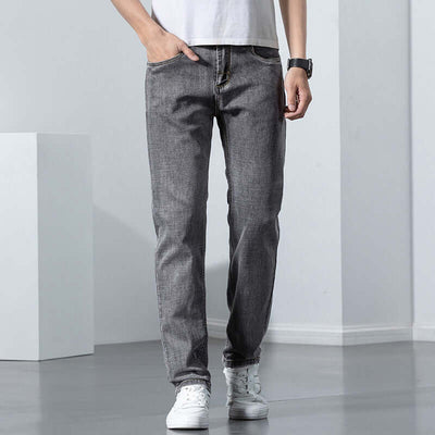 Men's straight elastic retro jeans in black gray color, featuring a mid-waist design and zip fly opening.