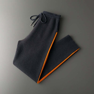 Men's thick casual trousers in dark gray with bright orange side stripes, perfect for leisure activities.