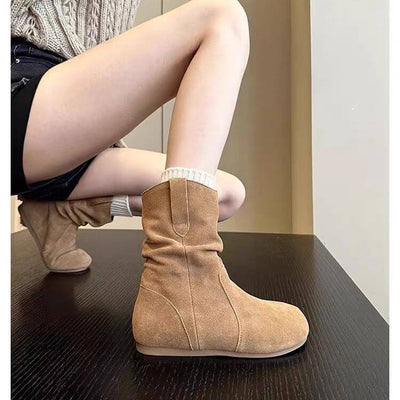 Western denim Martin boots for women in khaki color, shown with low tube design and flat heel.
