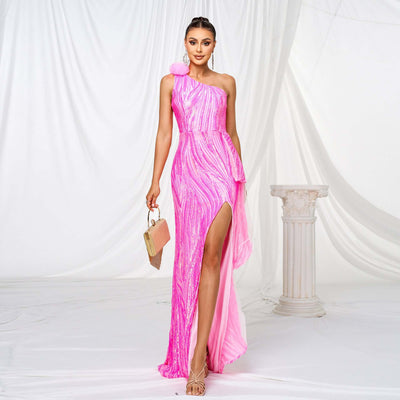 Elegant formal dress featuring sequins, single sleeve, and front slit