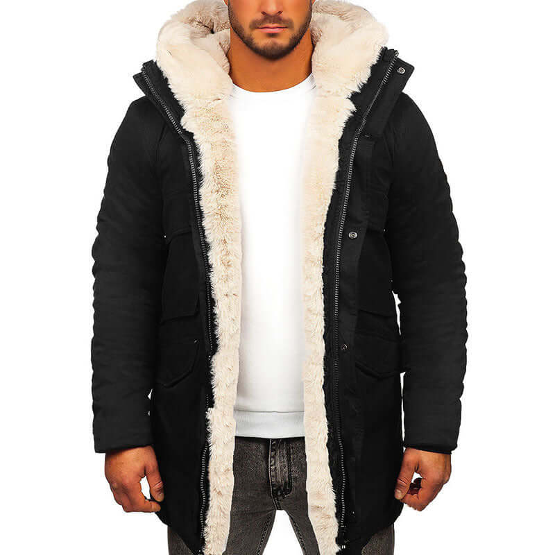 Men's thick black faux fur integrated hooded jacket with patch pockets and mid-length design.