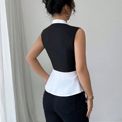 Women's sleeveless black and white false-two-piece shirt featuring a slim fit and stylish contrast colors.